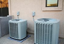 Air conditioning units on the side of a building